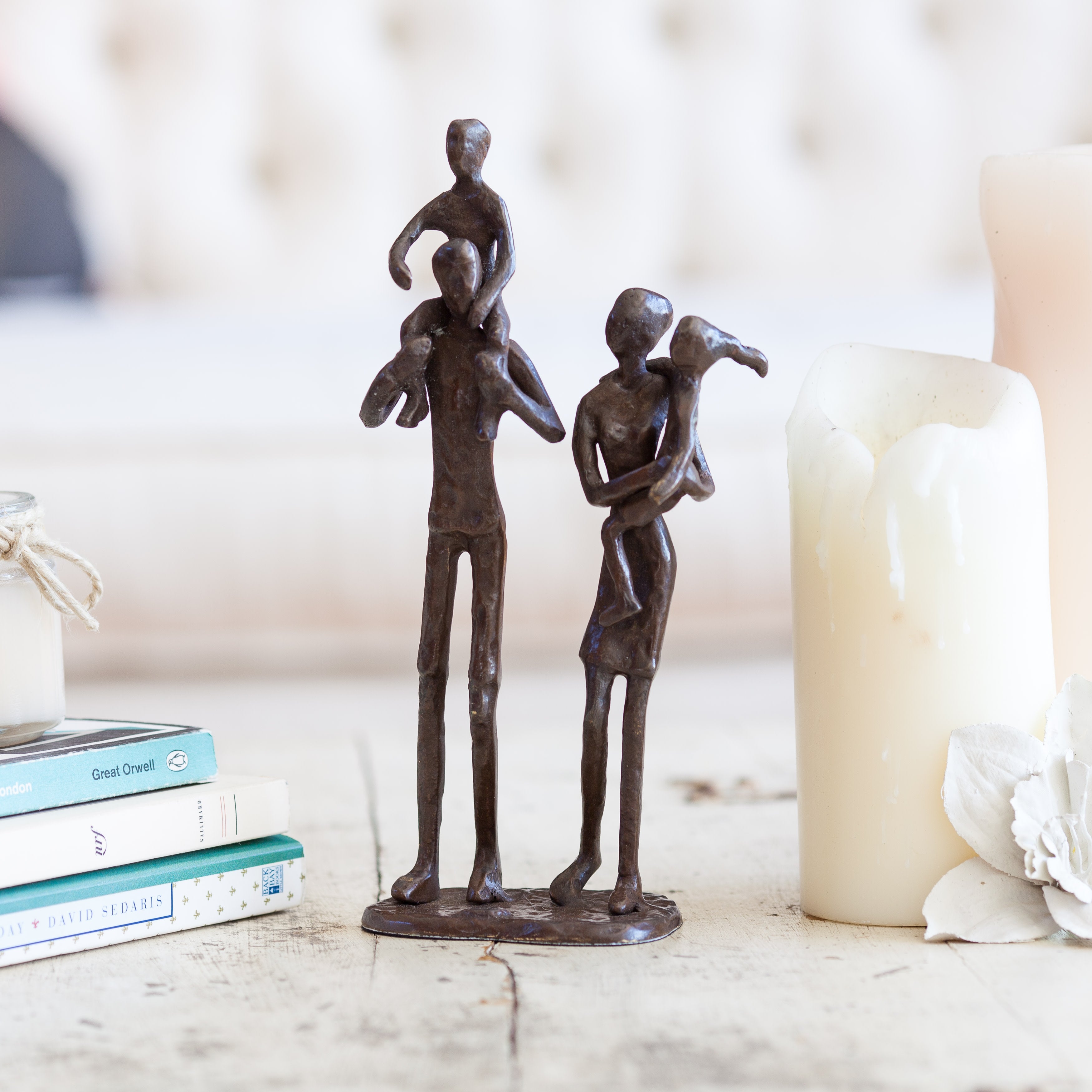 Parents Carrying Children Bronze Sculpture