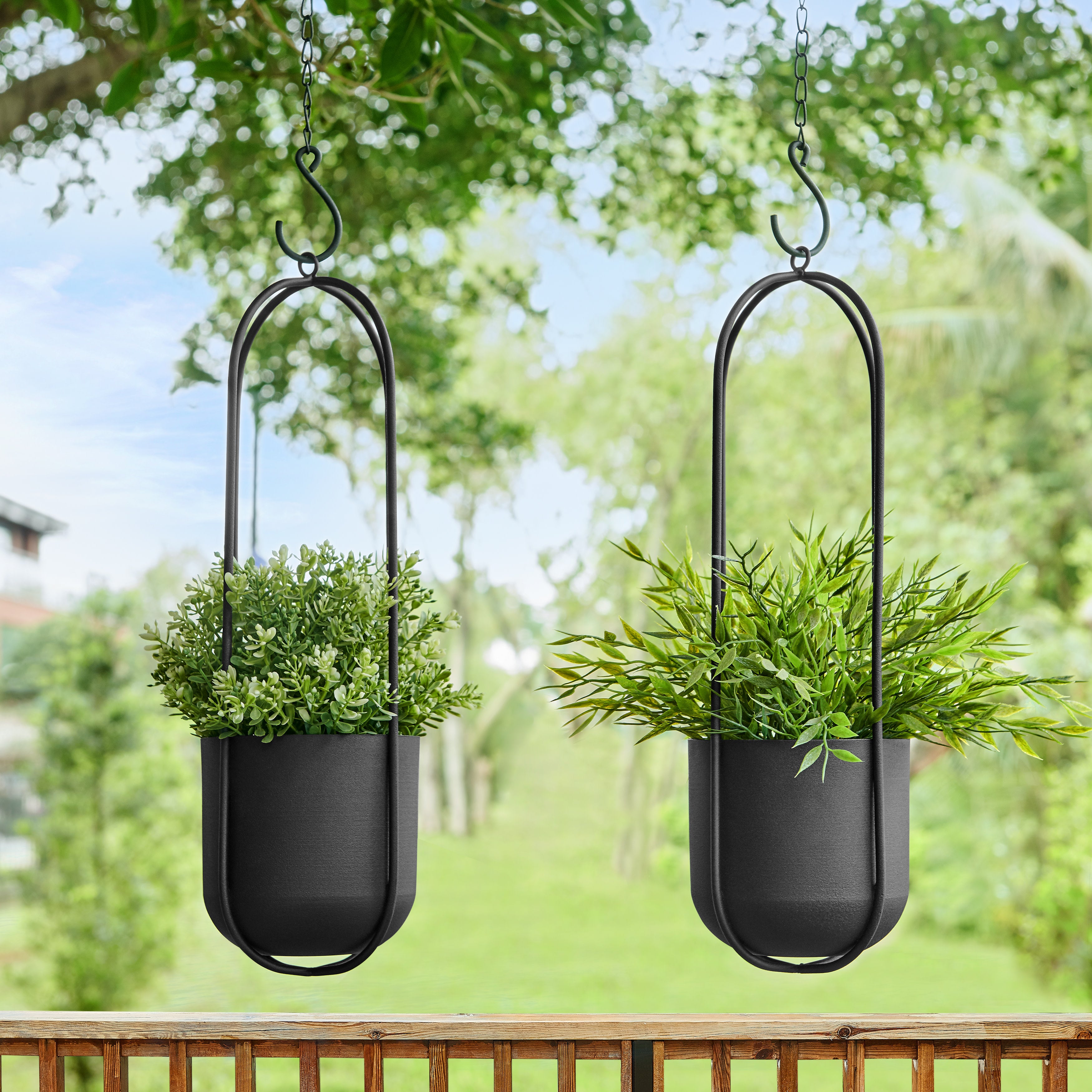 hanging metal planter Danya B. Walter 2-Piece Modern Black Metal Oval Hanging Planter Set with Chain Hanging Option